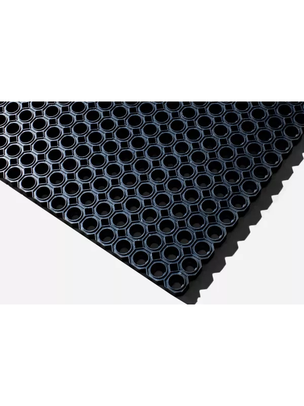 Angled view of rubber ring mat with raised edges and drainage holes – heavy-duty slip-resistant matting.